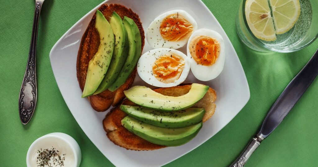 Hard-boiled eggs served with avocado toast as a protein-rich meal or snack